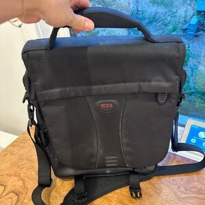 Tumi backpack or crossbody bag
